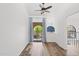 Bedroom featuring vaulted ceilings, a ceiling fan, wood-look floors, and sliding glass doors to a balcony at 8844 S 51St St # 3, Phoenix, AZ 85044