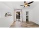 Bedroom boasts wood-look floors, balcony access, and a walk-in closet for ample storage at 8844 S 51St St # 3, Phoenix, AZ 85044