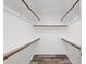 Walk in closet features wood look floor and shelving at 8844 S 51St St # 3, Phoenix, AZ 85044