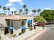 Two-story stucco townhome boasts balconies, arched windows, and lovely desert landscaping at 8844 S 51St St # 3, Phoenix, AZ 85044