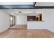 Bright living room featuring an open floor plan that connects the living area to the kitchen with tile flooring at 8844 S 51St St # 3, Phoenix, AZ 85044