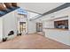 Inviting living room with open layout, cozy fireplace, tiled floors, and seamless kitchen access at 8844 S 51St St # 3, Phoenix, AZ 85044