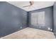 This bedroom has neutral walls and a window, creating a serene atmosphere at 924 E Baylor Ln, Gilbert, AZ 85296