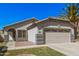 Charming single-story home featuring a two-car garage and well-maintained landscaping at 924 E Baylor Ln, Gilbert, AZ 85296