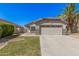 Charming single-story home features a two-car garage, well-manicured lawn, and lush landscaping at 924 E Baylor Ln, Gilbert, AZ 85296