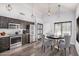 Chic kitchen with stainless steel appliances, modern lighting, and sleek countertops at 924 E Baylor Ln, Gilbert, AZ 85296