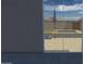 Outdoor patio with desert views from inside home, plus umbrella, tanning deck and privacy fence at 924 E Baylor Ln, Gilbert, AZ 85296