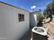 Exterior view showcases a satellite dish and an air conditioning unit at 9302 E Broadway Rd # 49, Mesa, AZ 85208