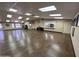 Large recreation room with a pass-through serving area and a spacious seating area at 9302 E Broadway Rd # 49, Mesa, AZ 85208