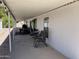 Spacious covered patio area with outdoor seating, great for relaxing or entertaining guests at 9302 E Broadway Rd # 49, Mesa, AZ 85208