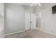 Bedroom with plush carpet, a closet and an ensuite bathroom at 9438 E Plana Ave, Mesa, AZ 85212