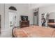 Spacious bedroom leading into bathroom and walk-in closet at 9438 E Plana Ave, Mesa, AZ 85212