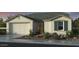 Beautiful single-story home featuring a two-car garage, neutral color palette, and desert landscaping at 10211 W Columbus Ave, Avondale, AZ 85392
