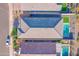 Top-down view of a roof, pool, and surrounding landscape, with neighboring homes at 11357 E Unger Ave, Mesa, AZ 85212