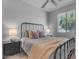 Bright bedroom with comfortable bed, contemporary style, and bright sunlight at 11357 E Unger Ave, Mesa, AZ 85212