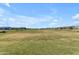 Expansive community park offering open space for recreation and relaxation in a residential area at 11357 E Unger Ave, Mesa, AZ 85212
