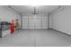 Spacious two car garage with sealed concrete floor, awaiting new owner's vehicles at 11357 E Unger Ave, Mesa, AZ 85212
