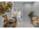 Inviting hallway with decoratively adorned console table, leading into home at 11357 E Unger Ave, Mesa, AZ 85212