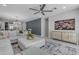 Cozy living room featuring a plush sectional sofa and stylish decorations at 11357 E Unger Ave, Mesa, AZ 85212