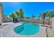 Refreshing pool with a covered patio and a beautiful, well maintained, backyard with charming string lights at 13349 W Boca Raton Rd, Surprise, AZ 85379