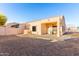 Rear exterior of home and patio area and zero-scaping at 14216 N Saguaro Blvd # A, Fountain Hills, AZ 85268
