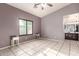 Bright bedroom featuring tile flooring, a window and ceiling fan at 14216 N Saguaro Blvd # A, Fountain Hills, AZ 85268