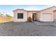 Charming single-story home featuring a gravel front yard, tile roof, and attached one-car garage at 14216 N Saguaro Blvd # A, Fountain Hills, AZ 85268
