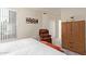 Inviting bedroom featuring a comfortable bed, a seating area, and ample storage space at 14950 W Mountain View Blvd # 1112, Surprise, AZ 85374