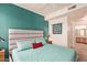 Cozy bedroom featuring a large bed, and ensuite bath, offering comfortable living space at 14950 W Mountain View Blvd # 1112, Surprise, AZ 85374