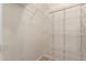 Walk-in closet with ample shelving, providing organized storage solutions for your wardrobe at 14950 W Mountain View Blvd # 1112, Surprise, AZ 85374