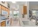 Well-lit kitchen with modern appliances and convenient access to the dining area at 14950 W Mountain View Blvd # 1112, Surprise, AZ 85374
