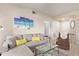 Comfortable living room with stylish decor, a cozy couch, and a relaxing atmosphere, perfect for unwinding at 14950 W Mountain View Blvd # 1112, Surprise, AZ 85374