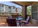 Relaxing patio with comfortable seating and views of the well-manicured grounds in a tranquil outdoor setting at 14950 W Mountain View Blvd # 1112, Surprise, AZ 85374