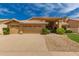 Beautiful single Gathering home with desert landscaping, a three-car garage, and a tile roof in a sunny neighborhood at 1590 W Desert Broom Dr, Chandler, AZ 85248