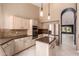 Spacious kitchen with stainless steel appliances, island, granite countertops, and ample cabinetry at 1590 W Desert Broom Dr, Chandler, AZ 85248