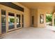 Spacious covered patio with direct access to the pool area via glass doors, great for outdoor relaxation at 1590 W Desert Broom Dr, Chandler, AZ 85248