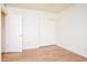 Bright bedroom with wood floors and closet at 1642 E Palm Beach Dr, Chandler, AZ 85249