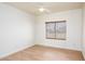 Comfortable bedroom with wood floors, neutral walls and lots of light at 1642 E Palm Beach Dr, Chandler, AZ 85249