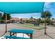 Outdoor bocce ball courts with shaded picnic tables provide recreational amenities for residents at 1642 E Palm Beach Dr, Chandler, AZ 85249