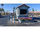 Community entrance with manicured flower beds and gate access at 1642 E Palm Beach Dr, Chandler, AZ 85249