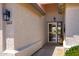 Inviting front entrance with charming exterior lighting and secure screen door at 1642 E Palm Beach Dr, Chandler, AZ 85249