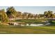 Scenic golf course view with water features and mountain backdrop at 1642 E Palm Beach Dr, Chandler, AZ 85249