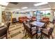 Cozy library with bookshelves, comfortable seating, and ample lighting for a relaxing reading experience at 1642 E Palm Beach Dr, Chandler, AZ 85249
