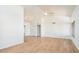 Spacious living area with wood flooring, high ceilings, and natural light at 1642 E Palm Beach Dr, Chandler, AZ 85249