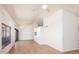 Bright living area with wood flooring, large windows, and vaulted ceilings at 1642 E Palm Beach Dr, Chandler, AZ 85249