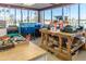 Bright workshop featuring worktables, equipment, and large windows offering abundant natural light at 1642 E Palm Beach Dr, Chandler, AZ 85249