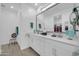 Elegant bathroom featuring double sinks, quartz countertops, and modern fixtures at 16593 W Alameda Rd, Surprise, AZ 85387
