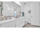 Bright bathroom with double vanity, spacious countertops, and contemporary design elements at 16593 W Alameda Rd, Surprise, AZ 85387