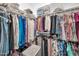 Walk-in closet with ample storage space and shelving for clothes and accessories organization at 16593 W Alameda Rd, Surprise, AZ 85387
