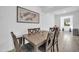 Stylish dining area with a rustic table and comfortable upholstered chairs at 16593 W Alameda Rd, Surprise, AZ 85387